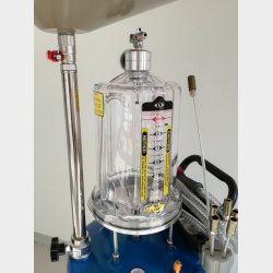 Olieaftapper m. vacummfunktion i klokke proff