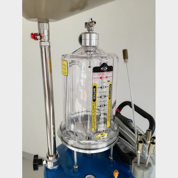 Olieaftapper m. vacummfunktion i klokke proff